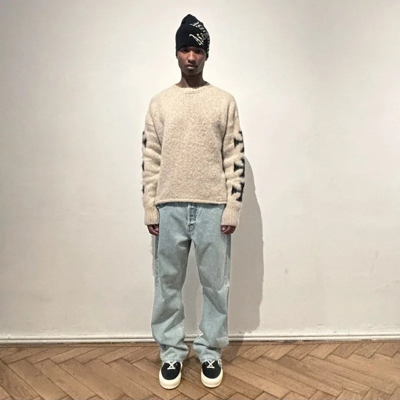 TRIPPIN'™ Crossed Arms Knitted Sweater